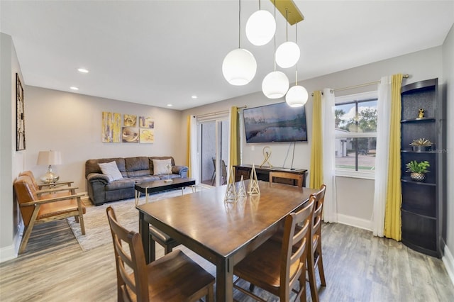 dining room featuring light hardwood / wood-style flooring