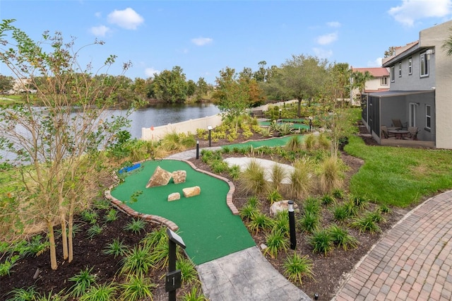 view of home's community with a water view