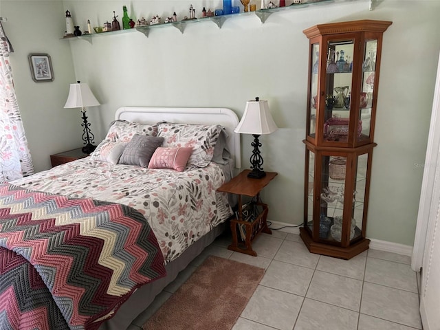 bedroom with light tile patterned flooring