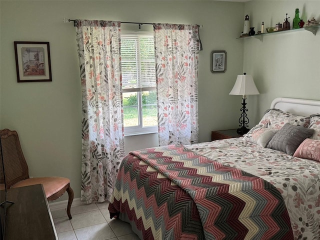 bedroom with light tile patterned flooring