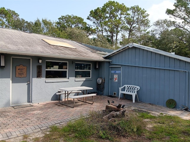 exterior space with a patio area