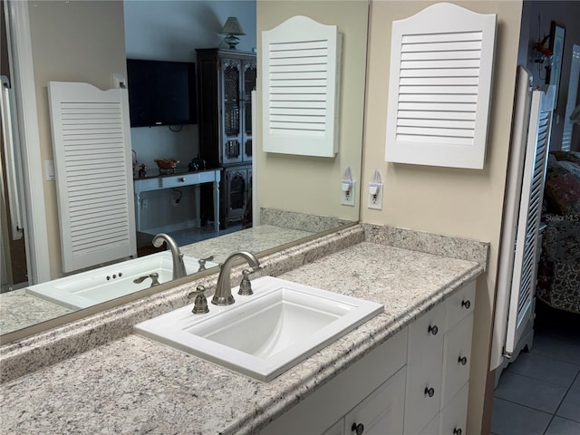 bathroom featuring vanity and tile patterned floors