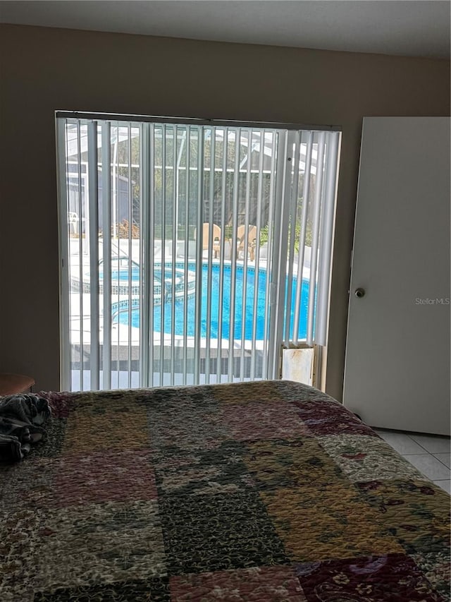 bedroom with tile patterned floors