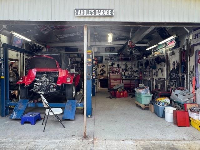 garage with a workshop area