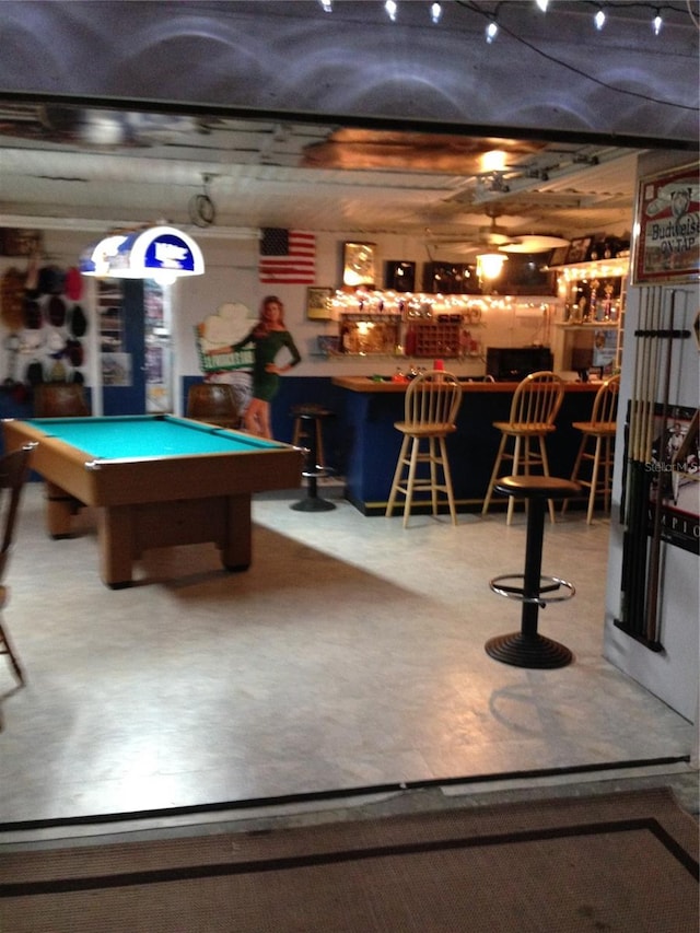 game room featuring bar area and pool table