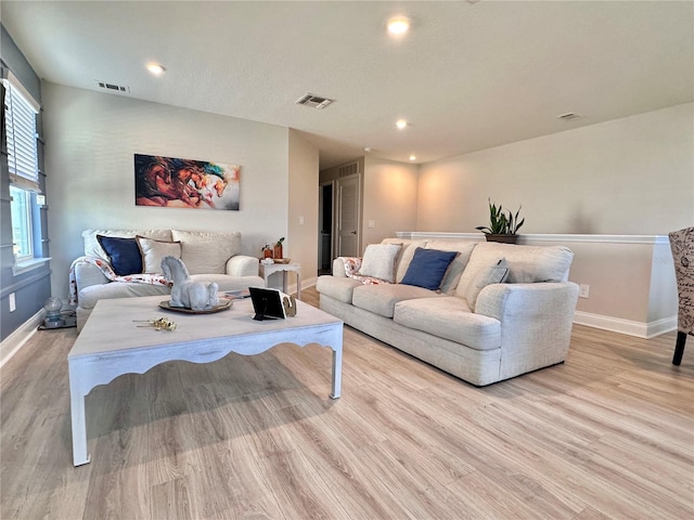 living room with light wood-type flooring