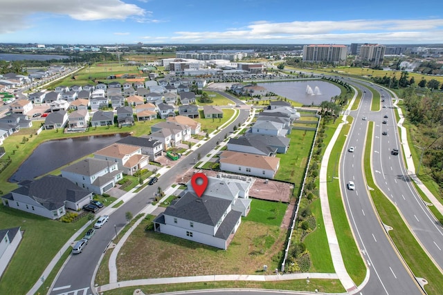 drone / aerial view with a water view