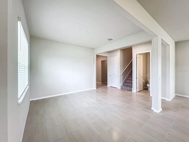 spare room with light tile patterned flooring