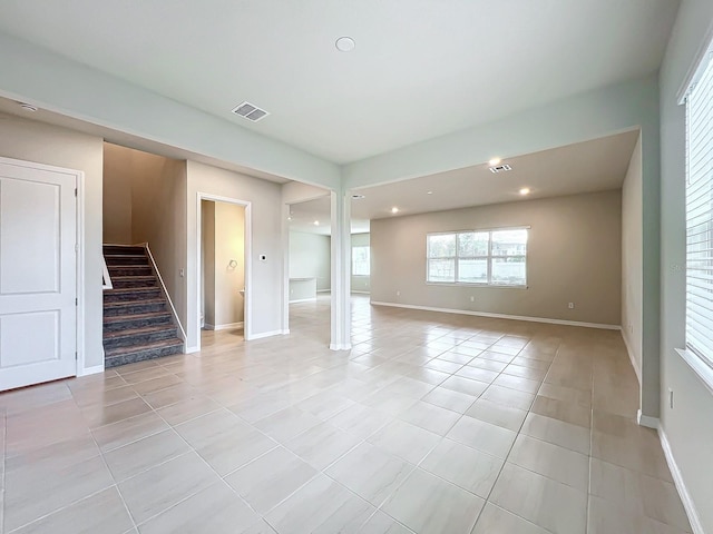 empty room with light tile patterned flooring