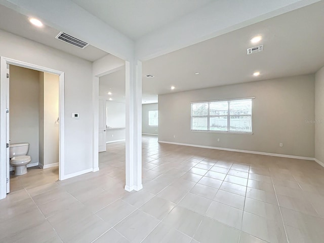 spare room with light tile patterned floors