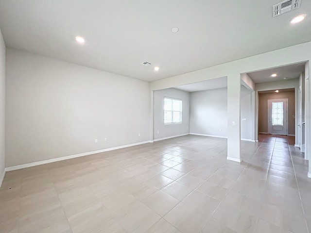 empty room featuring light tile patterned floors