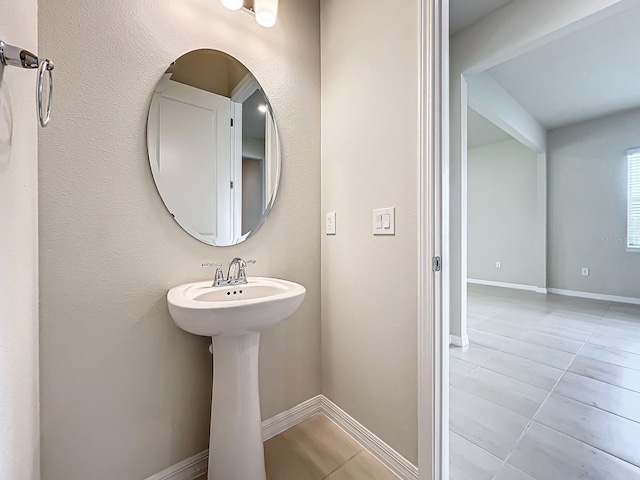 bathroom with tile patterned flooring