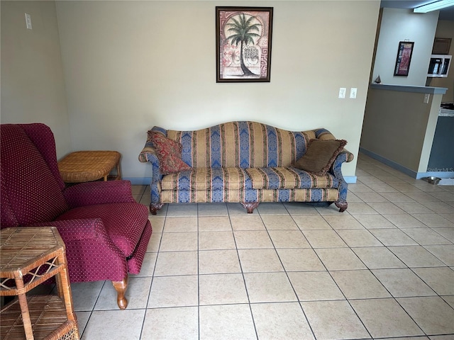 living room with light tile patterned flooring