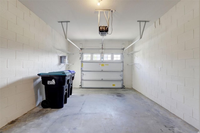 garage featuring a garage door opener