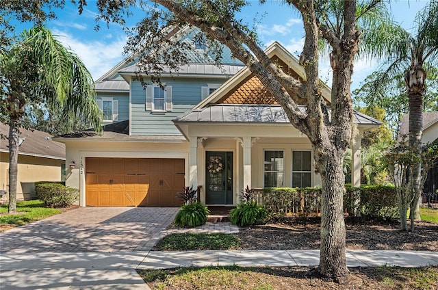 view of front of property featuring a garage