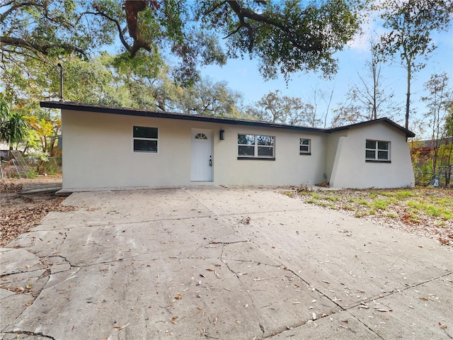 ranch-style house with a patio area