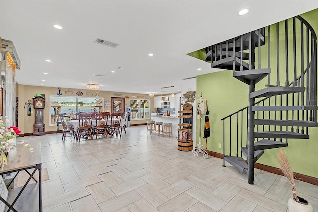 dining room with light parquet floors