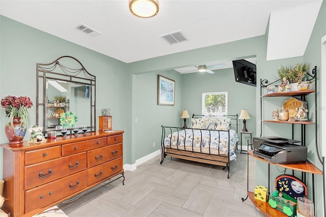 bedroom featuring light parquet flooring