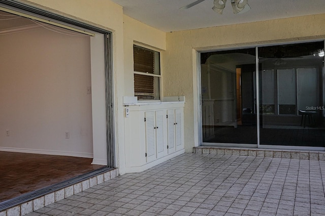 view of patio with ceiling fan