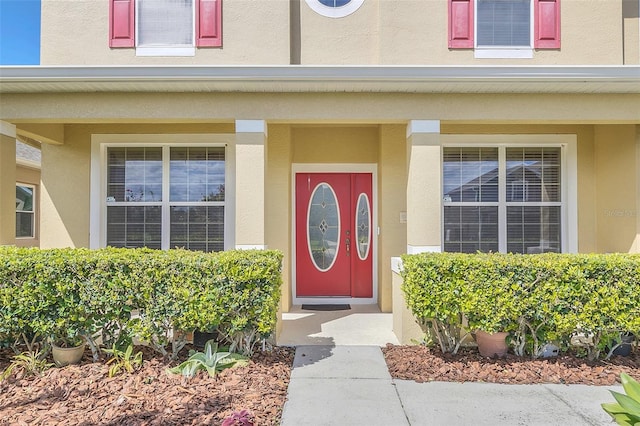 entrance to property with a porch