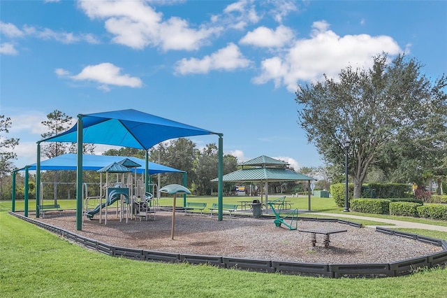 view of jungle gym with a gazebo and a lawn