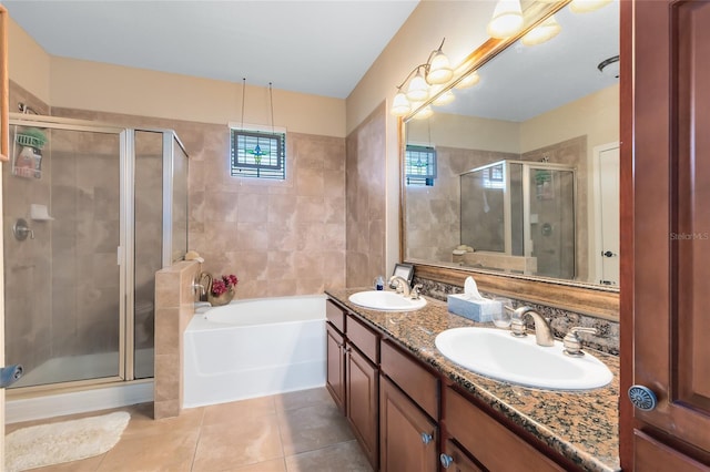 bathroom featuring vanity, independent shower and bath, and tile patterned flooring