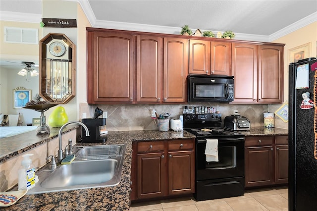 kitchen featuring tasteful backsplash, sink, ornamental molding, and black appliances