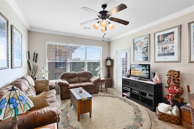 living room featuring ornamental molding and ceiling fan