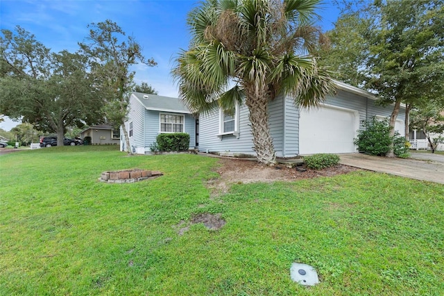 view of front facade featuring a garage and a front yard