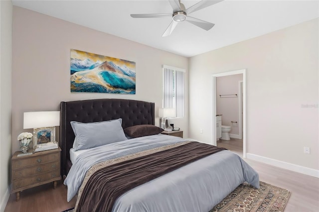 bedroom with connected bathroom, ceiling fan, and light hardwood / wood-style floors