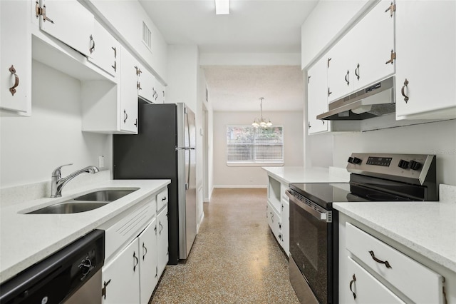 4221 Mizell St, Orlando, FL 32812 - kitchen with a sink, light countertops, stainless steel appliances, white cabinetry, and under cabinet range hood