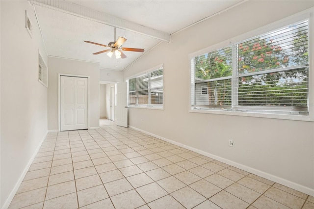 4221 Mizell St, Orlando, FL 32812 - empty room with a ceiling fan, visible vents, light tile patterned floors, baseboards, and vaulted ceiling with beams
