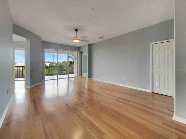 spare room with light wood-type flooring