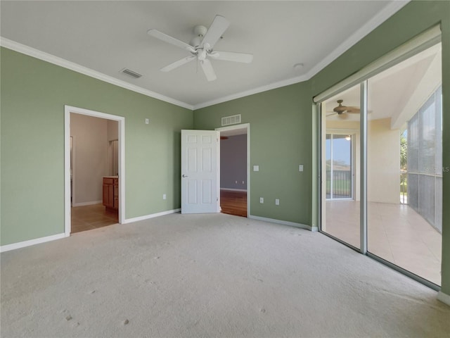 unfurnished bedroom with light colored carpet, ceiling fan, ornamental molding, and ensuite bath