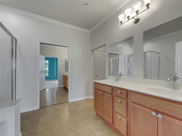 bathroom featuring vanity, an enclosed shower, ornamental molding, and tile patterned flooring