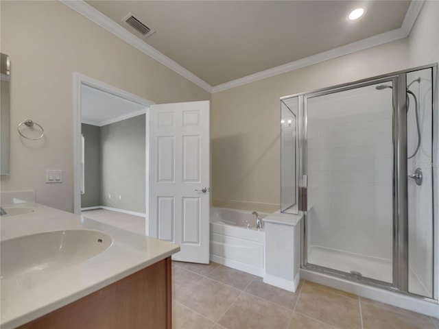 bathroom featuring vanity, crown molding, plus walk in shower, and tile patterned floors