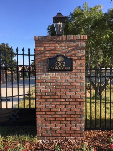 view of community sign