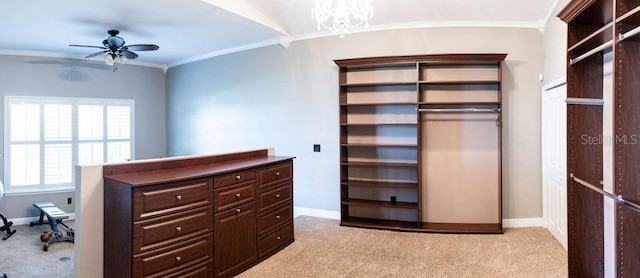 spacious closet featuring light carpet and ceiling fan with notable chandelier