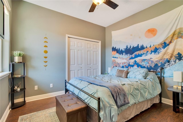 bedroom featuring a closet, dark wood-type flooring, and ceiling fan