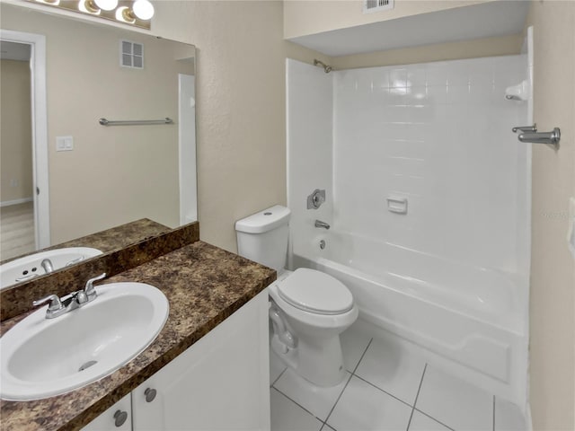 full bathroom with vanity, toilet, tile patterned floors, and washtub / shower combination