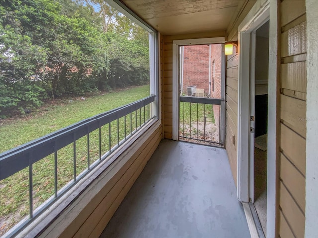 unfurnished sunroom featuring a wealth of natural light