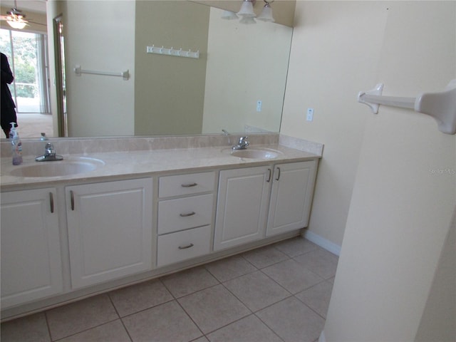 bathroom with vanity, tile patterned floors, and ceiling fan