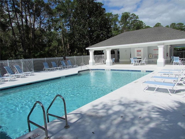 view of pool featuring a patio area