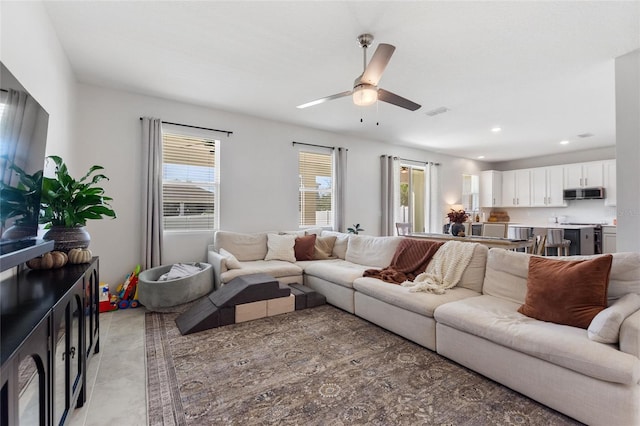 living room featuring ceiling fan