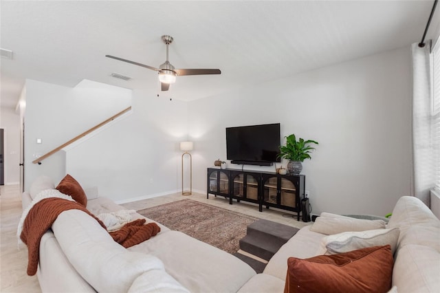 living room with ceiling fan