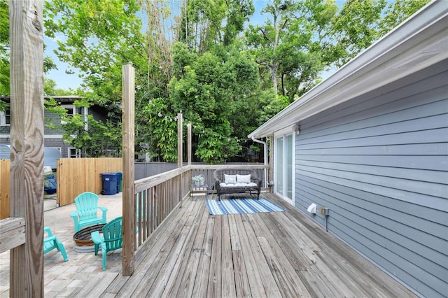 wooden deck featuring a patio area