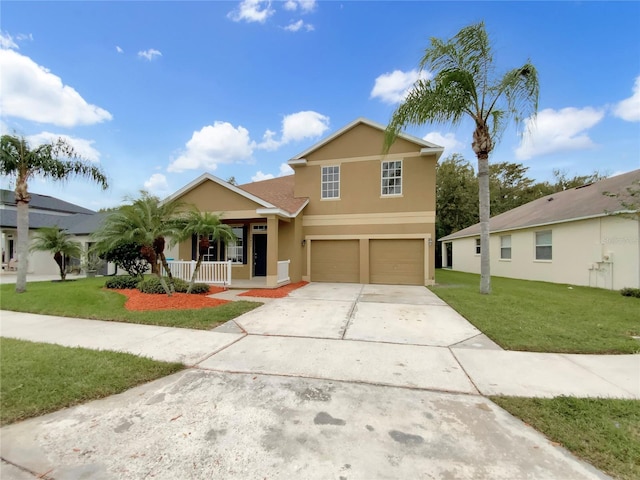 view of property featuring a front yard, a porch, and a garage