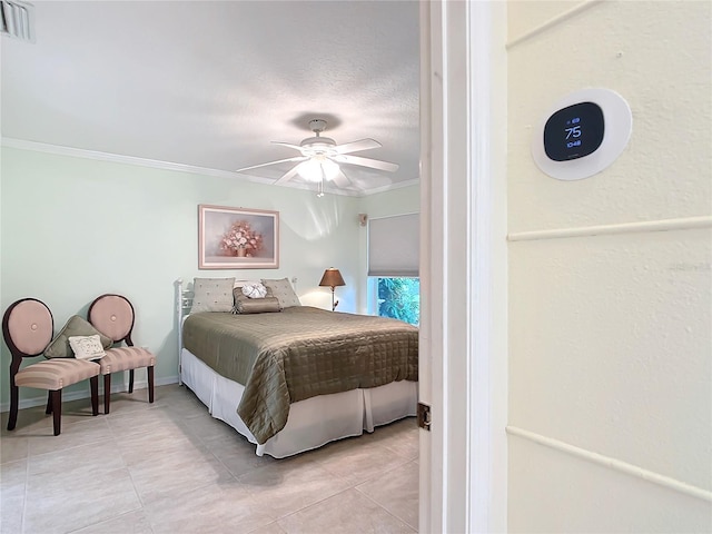 bedroom with crown molding and ceiling fan