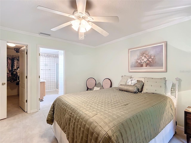 bedroom featuring connected bathroom, crown molding, light tile patterned floors, and ceiling fan