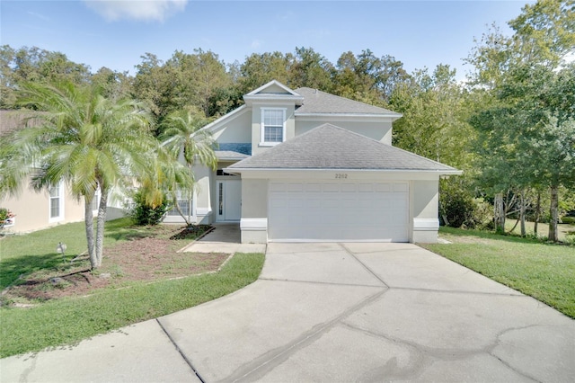 view of front facade featuring a front yard and a garage